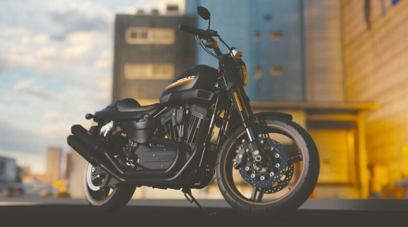 A modern black sports motorcycle parked in an urban setting with buildings in the background during sunset