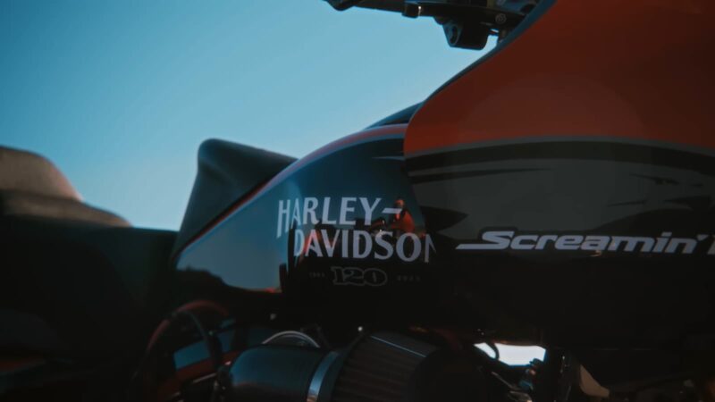 Close-up of a Harley-Davidson 120 engine with orange and black colors